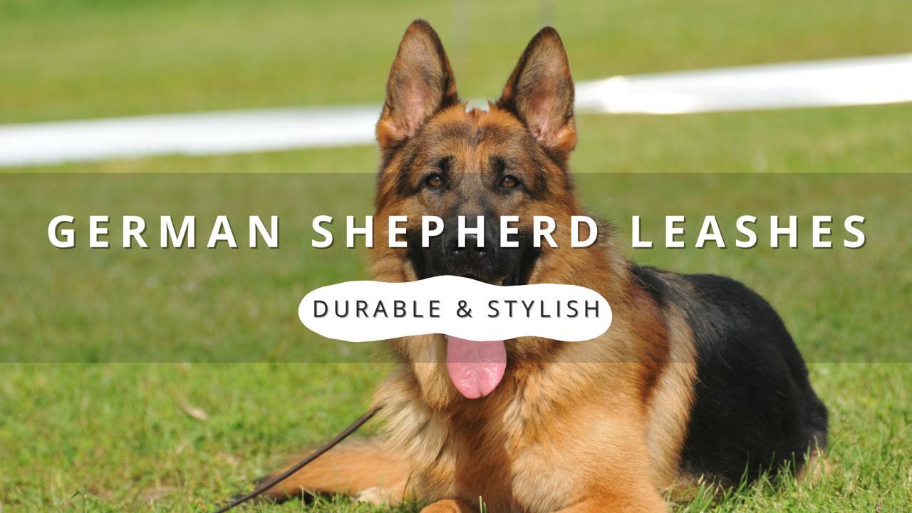German Shepherd dog lying on grass with text overlay: "German Shepherd Leashes - Durable & Stylish.