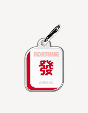 Customized dog ID tag with 'fortune' text and red mahjong design on a white background.