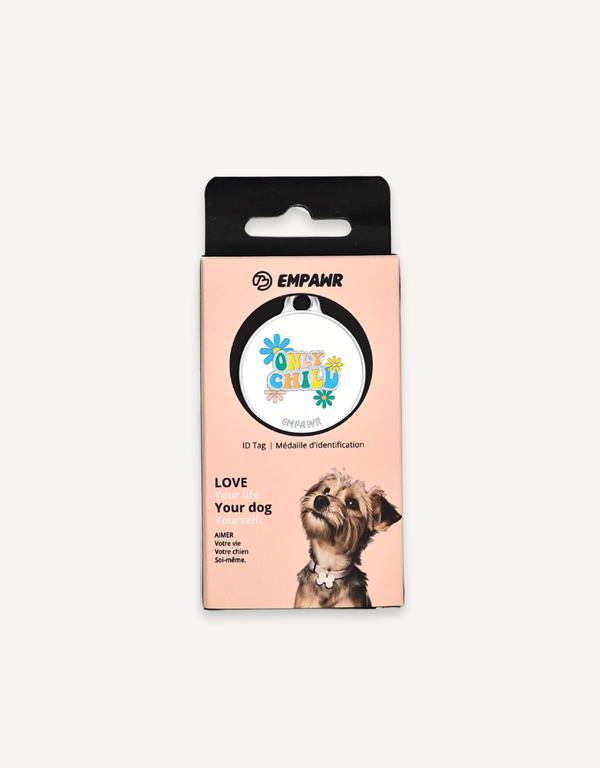  Colorful Empawr pet tag with "Only Child" message and floral design, displayed in its retail packaging with a small dog image.
