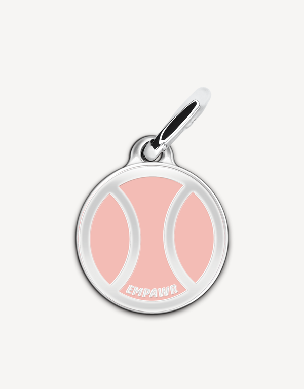 empawr tennis ball charm, pink and white enamel on a silver-tone backing.
